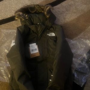 Green toddler North Face coat